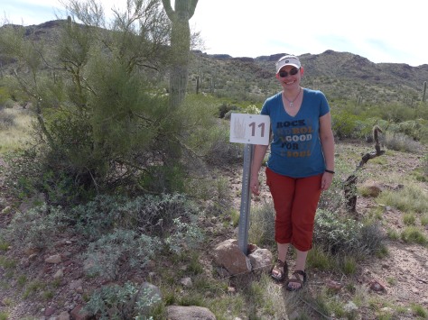 Me next to a marker for the Ajo Mtn Drive. I wrote the guide book for it!  - photo by M
