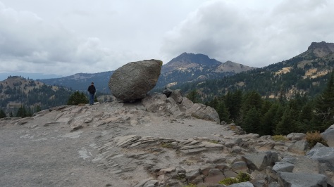 M bundled up to stand in the wind next to a glacial erratic. (for non-geology nerd, a glacial erratic is a big rock that isn't where its supposed to be. It was deposited in a random spot by glaciers many eons ago)